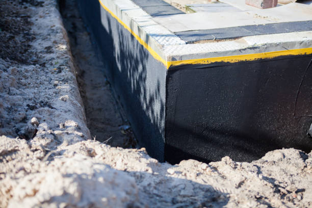 Professional Interior Drainage System technician working in Eau Claire, WI